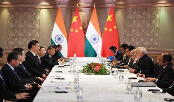 At bilateral meet PM Modi and Prez Xi Jinping agree to boost closer partnership