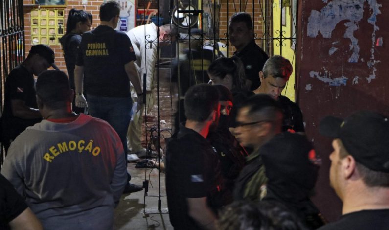 Eleven dead in shooting massacre after gunman storm Brazil bar
