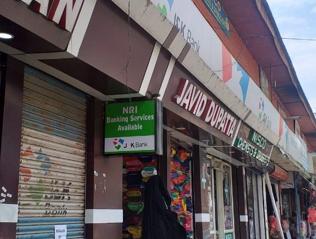 JK bank building sealed in new market Anantnag by WAKF board for not paying rent