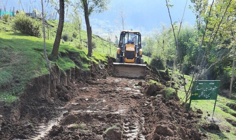 Earth mover seized, case registered against BJP worker for trying to grab portion of graveyard Earth mover seized, case registered against BJP worker for trying to grab portion of graveyard