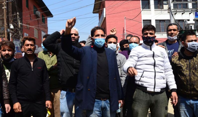 Kashmir Trade Alliance protest in Srinagar against govt move to re-register of non local vehicles