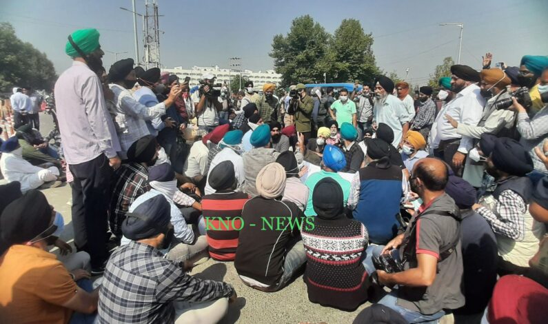 Family members, relatives of slain School principal stage silent sit-in outside Civil Secretariat, Sgr