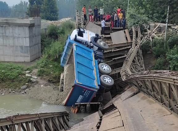 Steel bridge collapses after dumper drove over it in Central Kashmir Steel bridge collapses after dumper drove over it in Central Kashmir